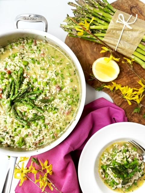 a bowl of spring asparagus risotto garnished with mint