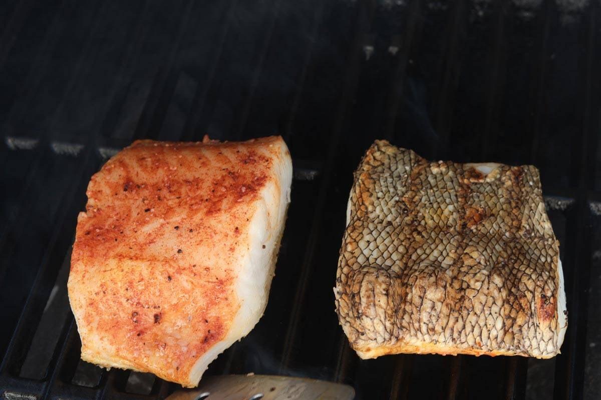 close up of chilean sea bass fillet being grilled