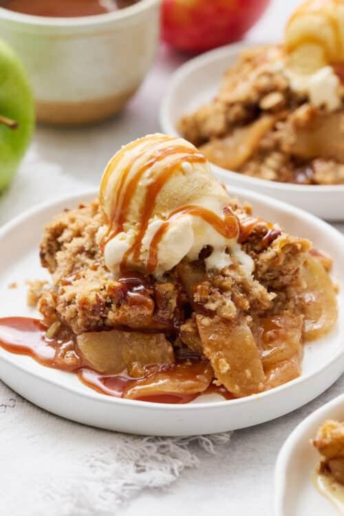 salted caramel apple crisp in baking dish, golden brown crumble topping