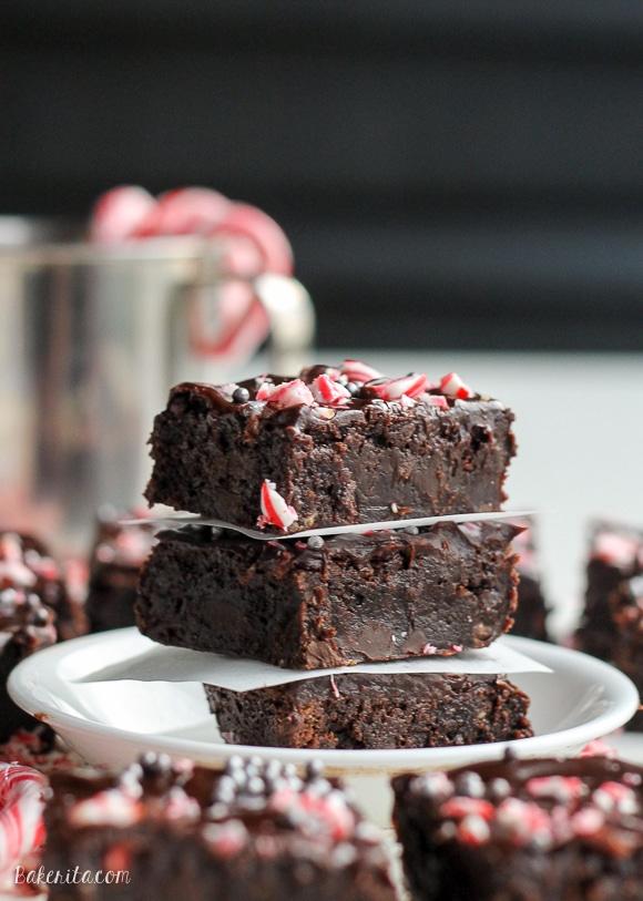 a baker adding peppermint extract to a brownie batter