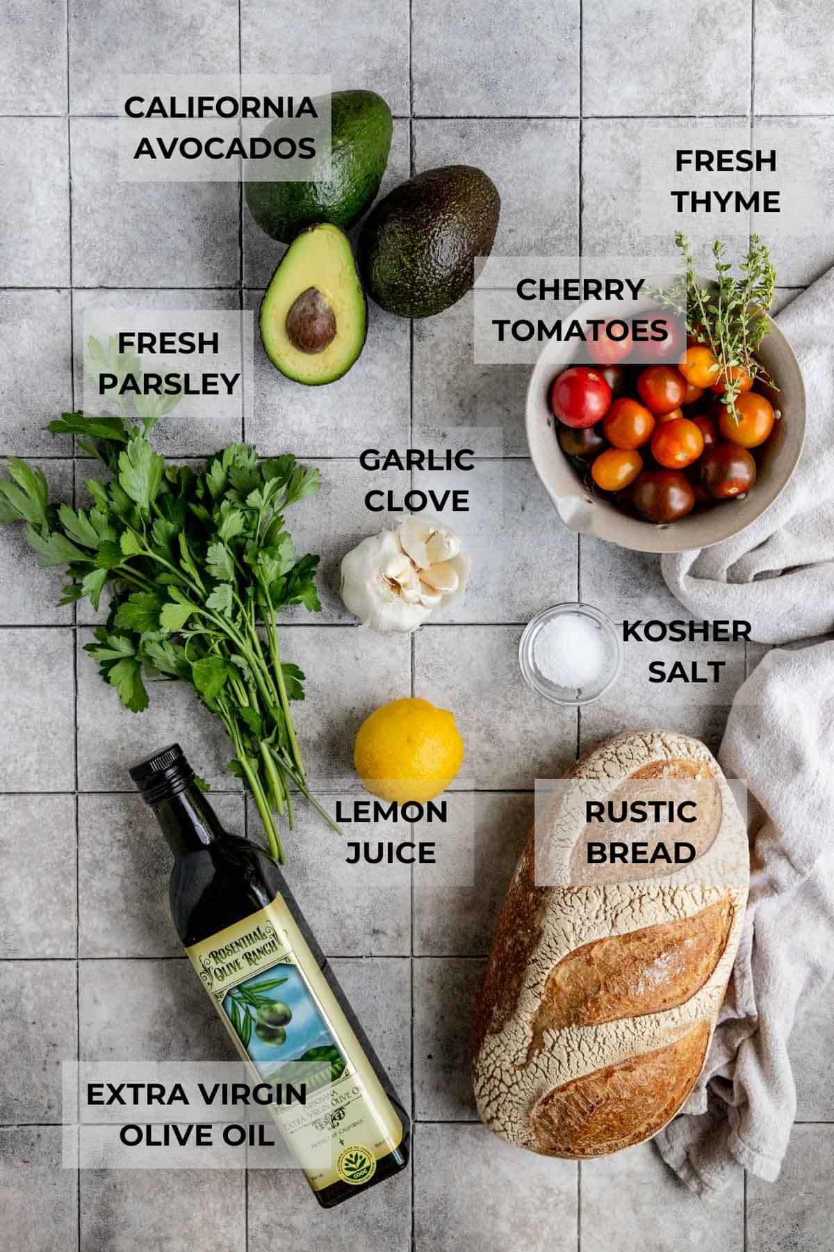 ingredients for rosemary garlic avocado toast laid out on a kitchen counter