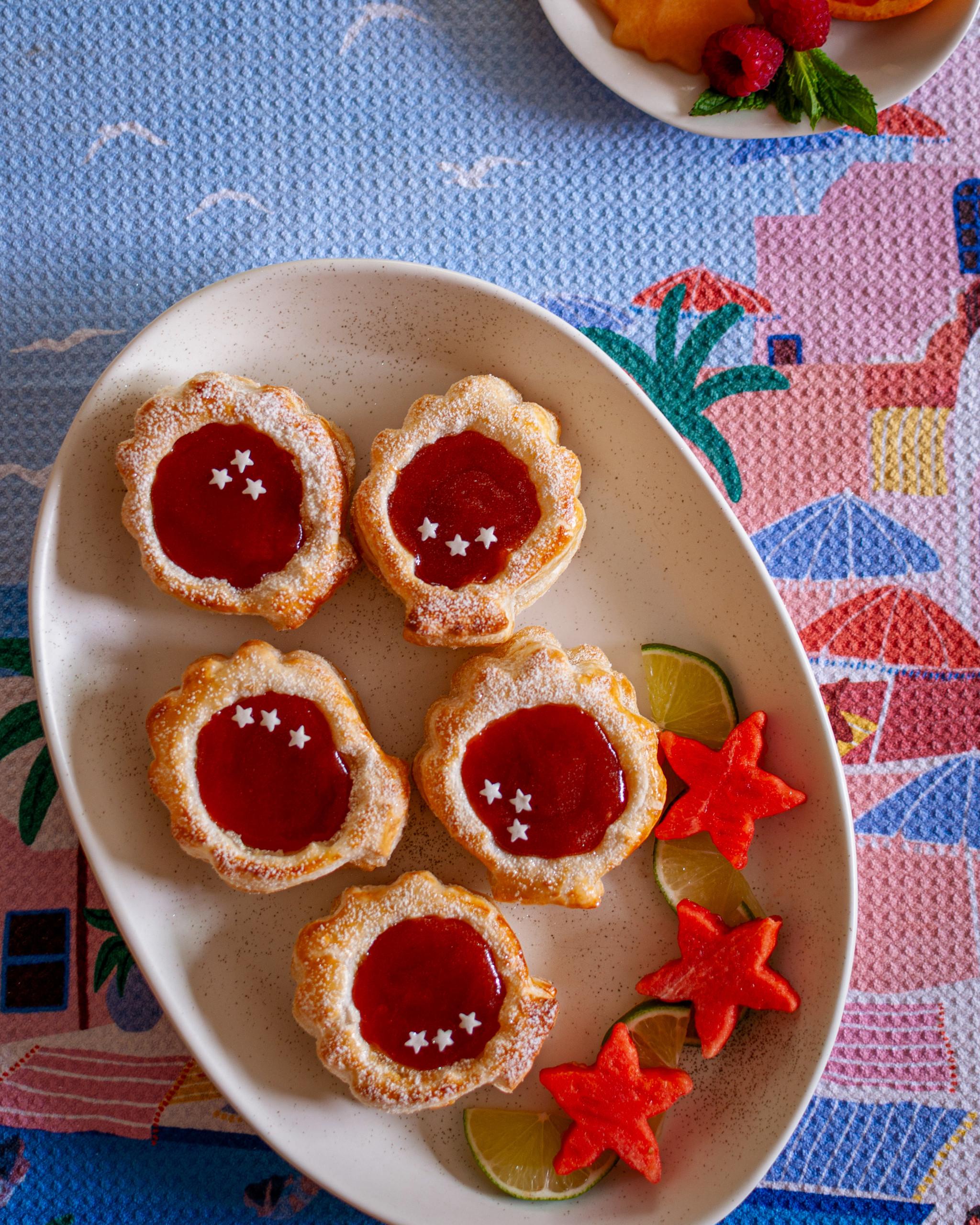 Overhead shot of the finished guava cream tart, beautifully decorated