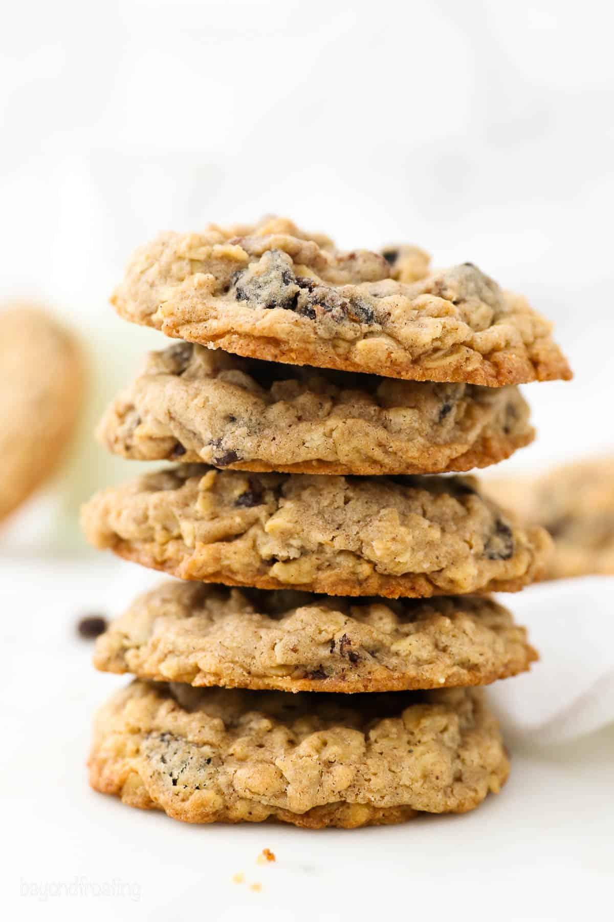 stack of homemade chewy oatmeal raisin cookies with a bite taken out