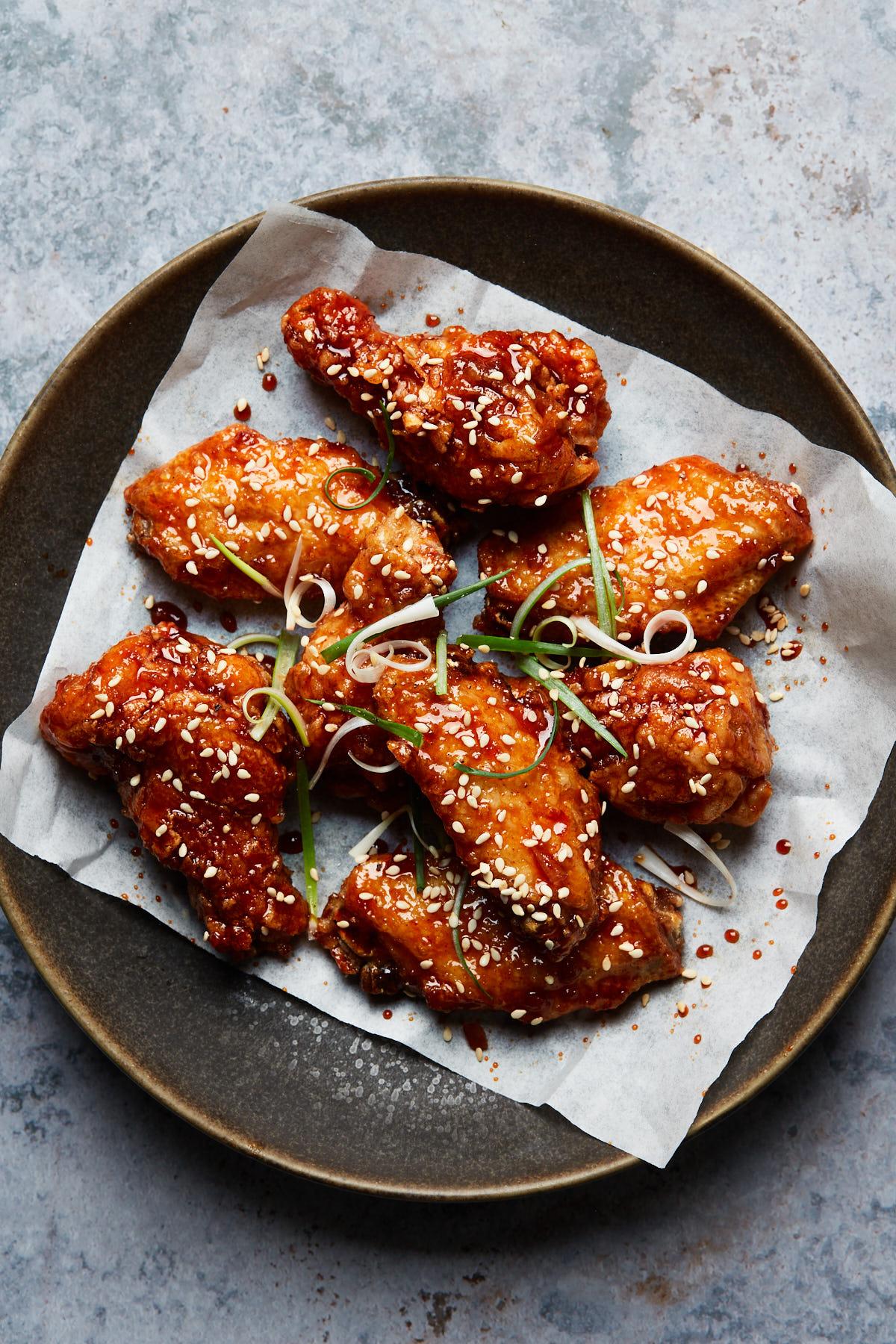 Korean fried chicken wings on a platter