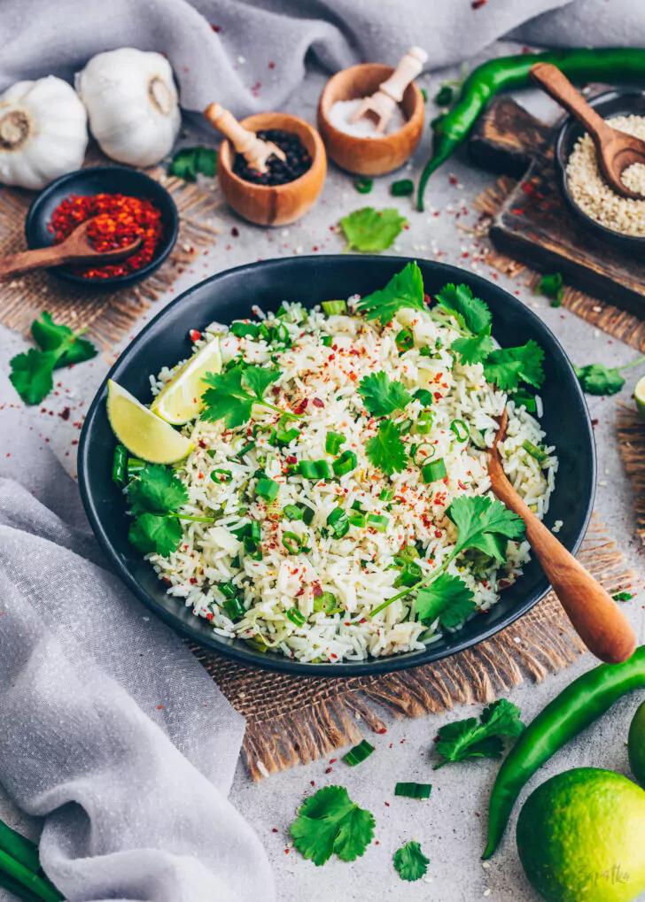 close-up shot of cilantro-lime rice with plant-based meatballs and various toppings