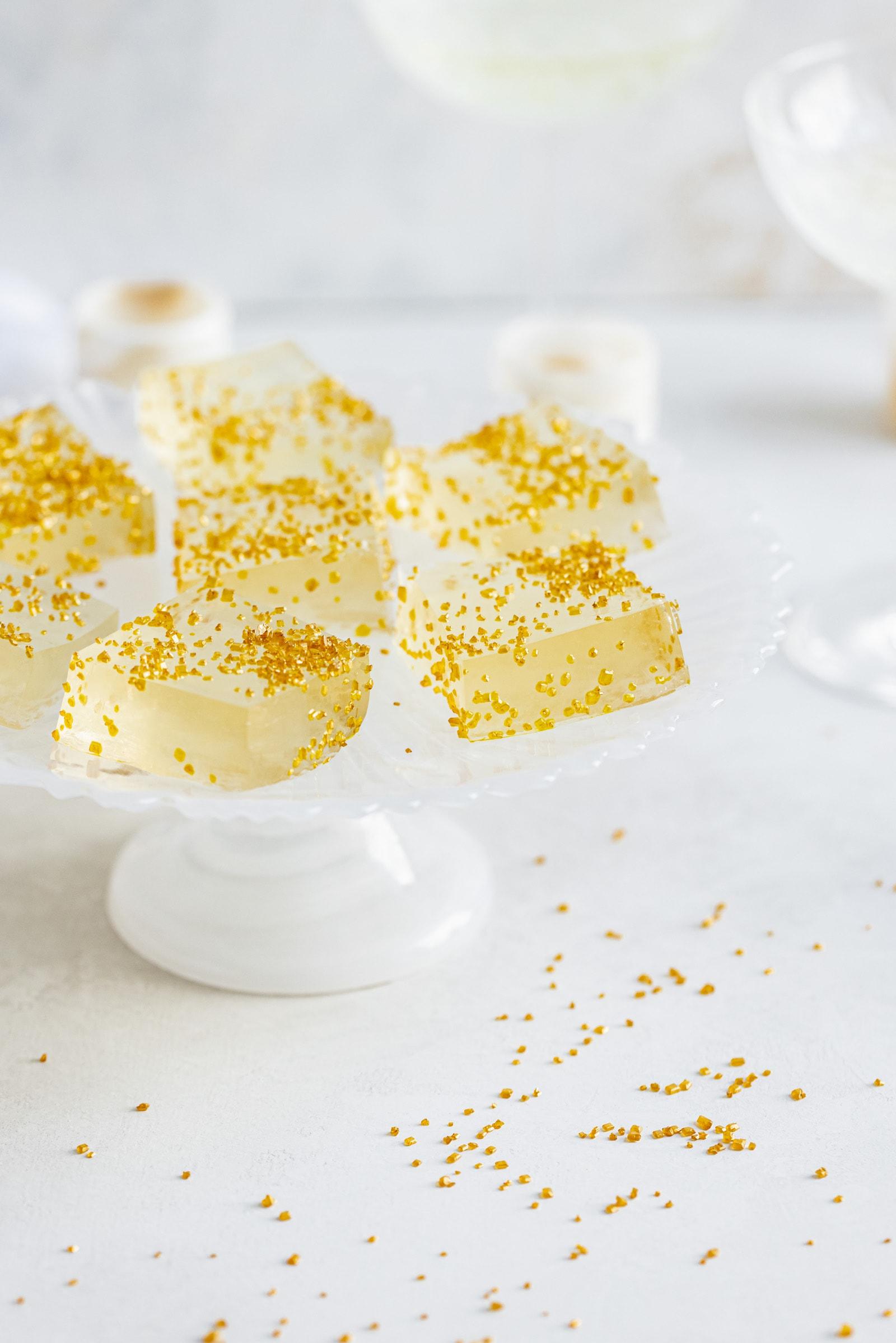close-up shot of a single Bubbly Bliss Bite, revealing the creamy Champagne ganache filling