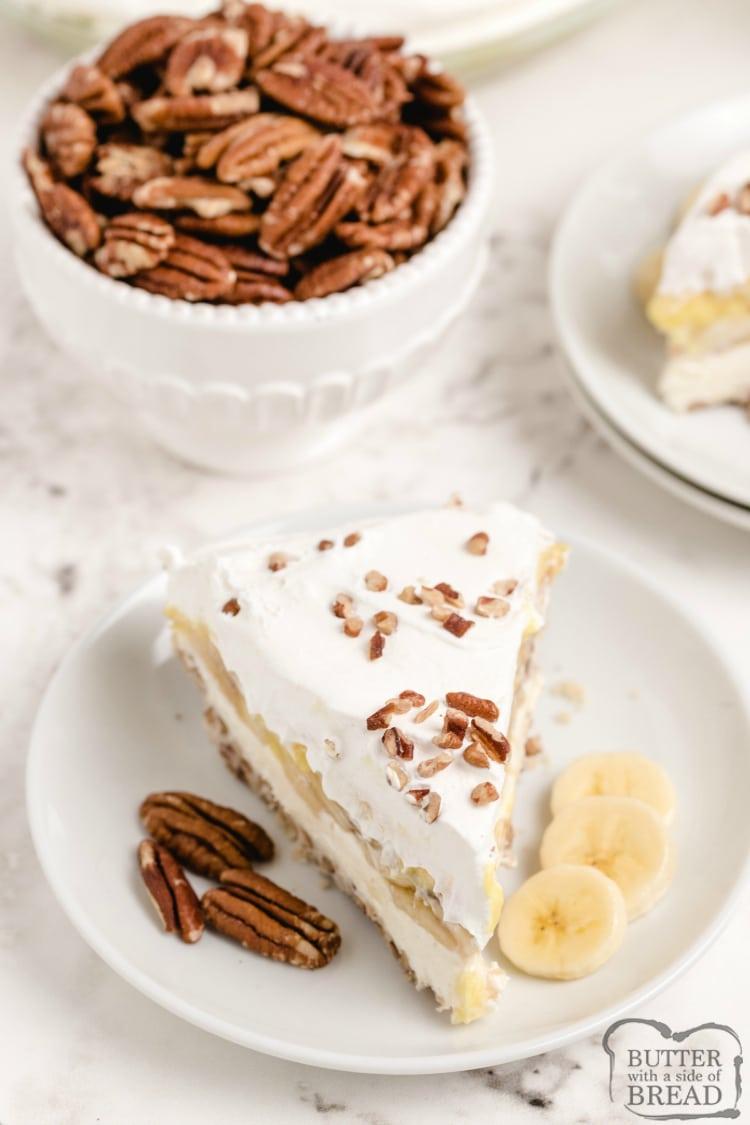 slice of plantain and pecan pie with whipped cream