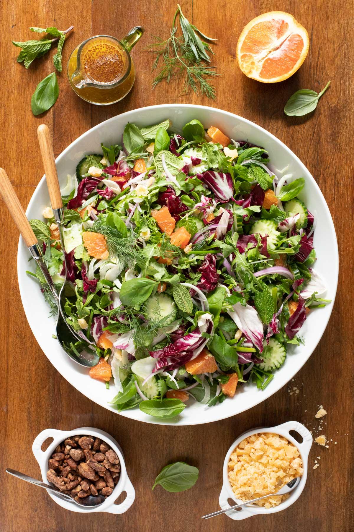 A vibrant spring citrus salad with a lemon vinaigrette dressing, garnished with fresh herbs