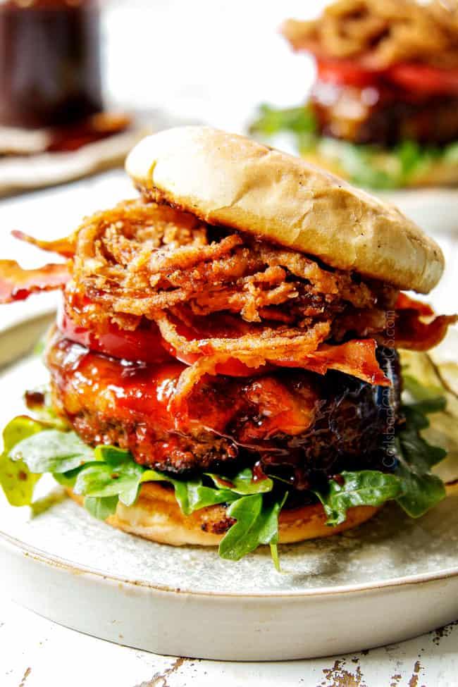 juicy burger with toppings and BBQ sauce