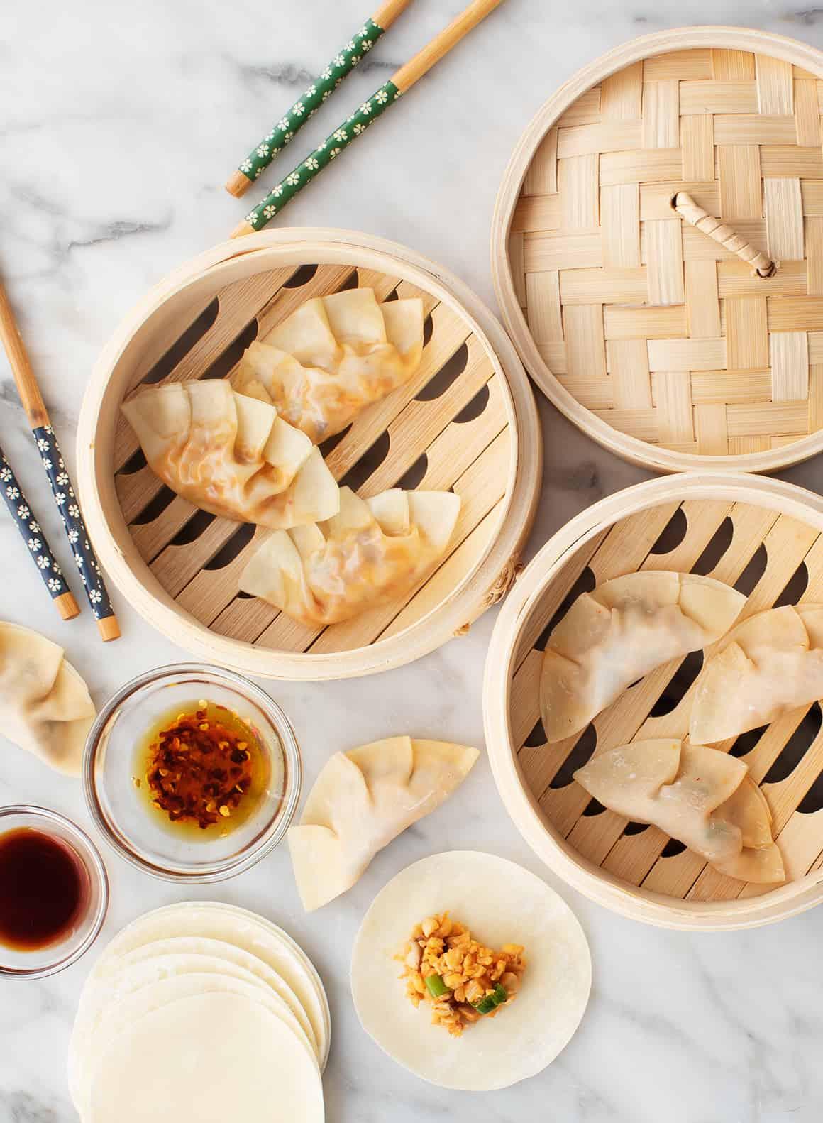 steaming lamb kofta dumplings in bamboo steamer