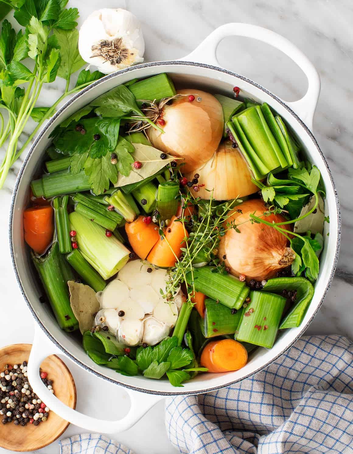 homemade vegetable broth simmering in a pot