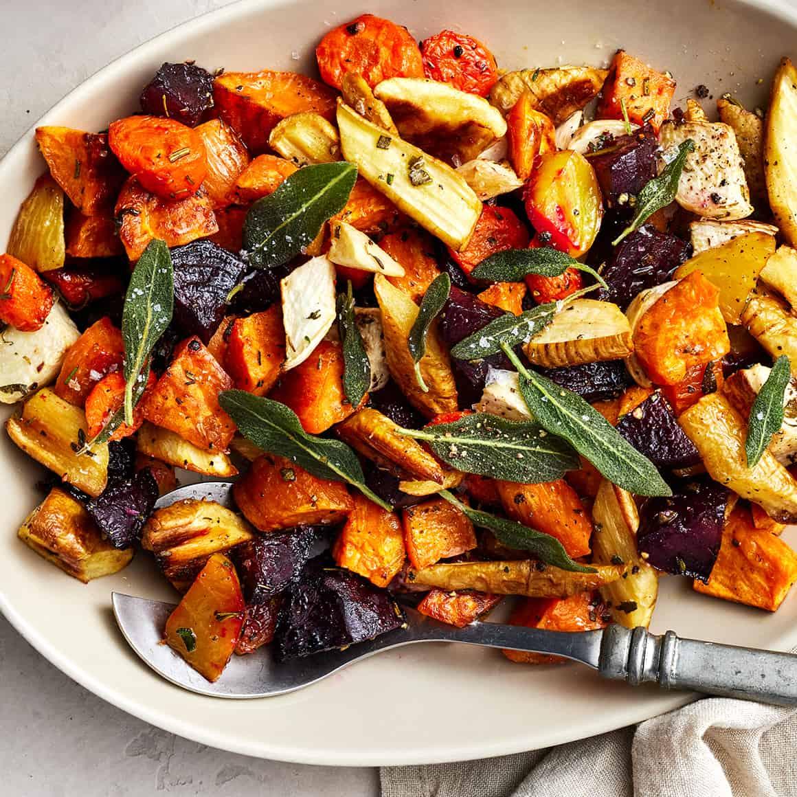 chopping root vegetables for roasting