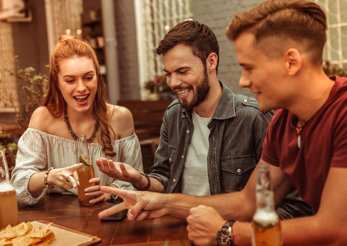 people playing a beer game