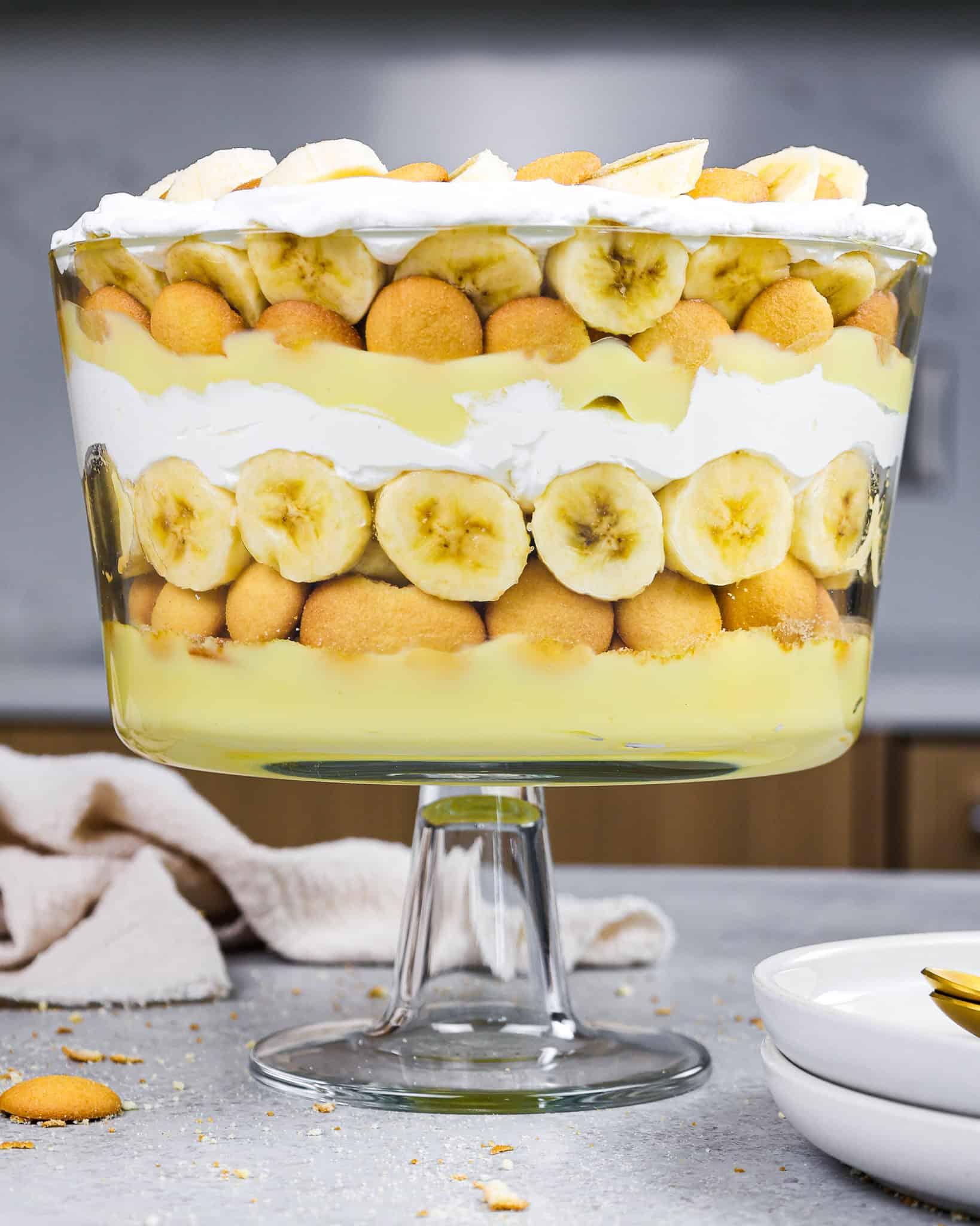 layered banana cream pie trifle in a glass dish