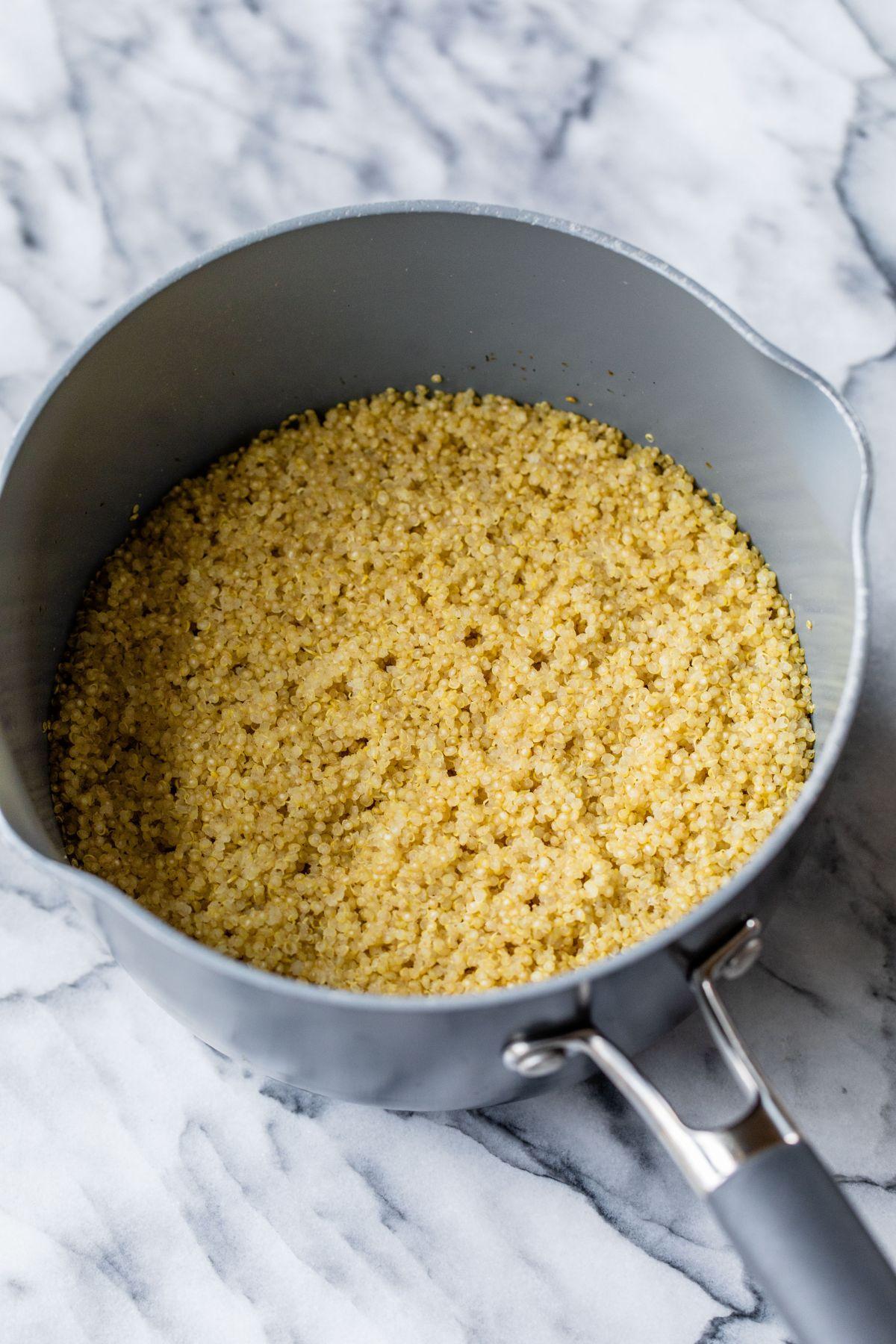 cooking quinoa in a saucepan