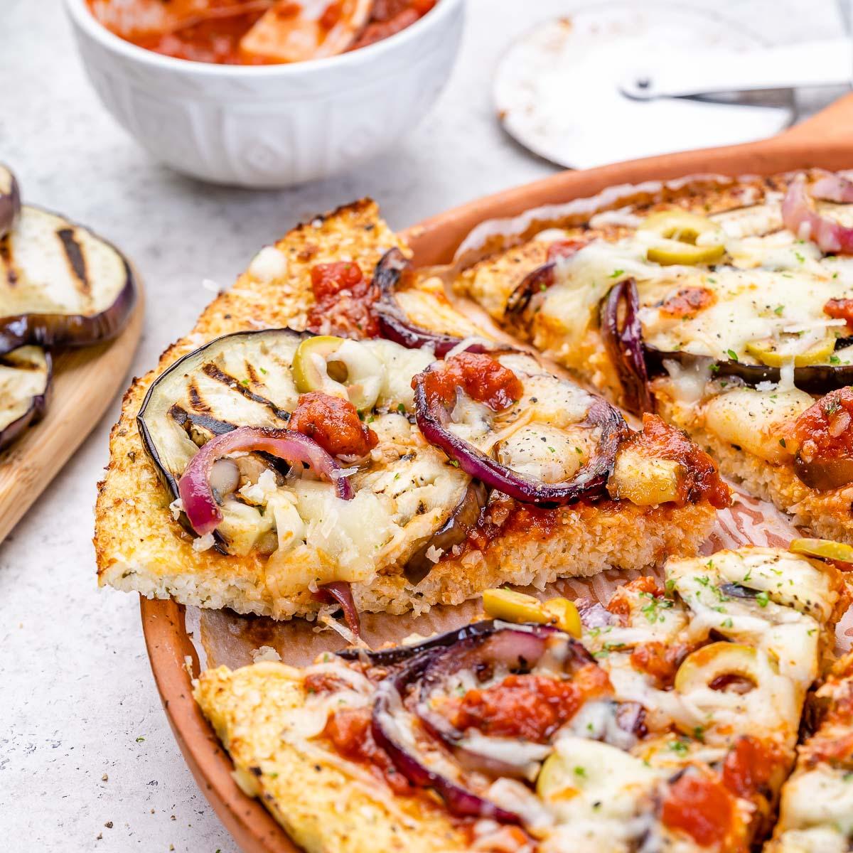 Close up shot of a delicious cauliflower crust pizza with assorted roasted vegetables