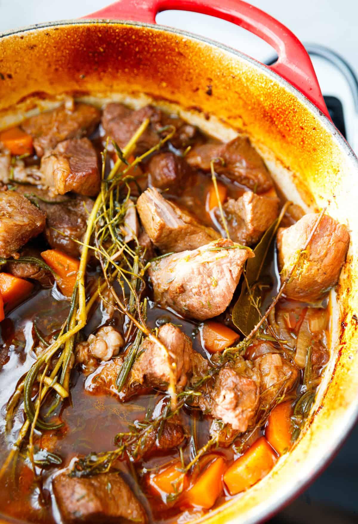 close-up of tender beef chunks and vegetables simmering in a rich broth