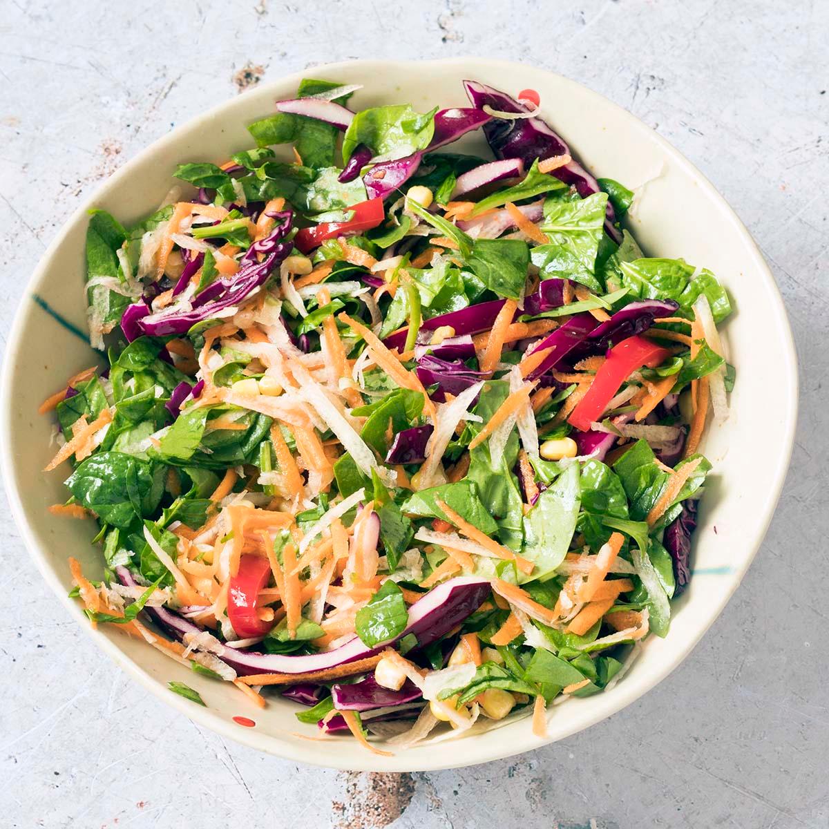 overhead shot of a vibrant rainbow vegetable bowl