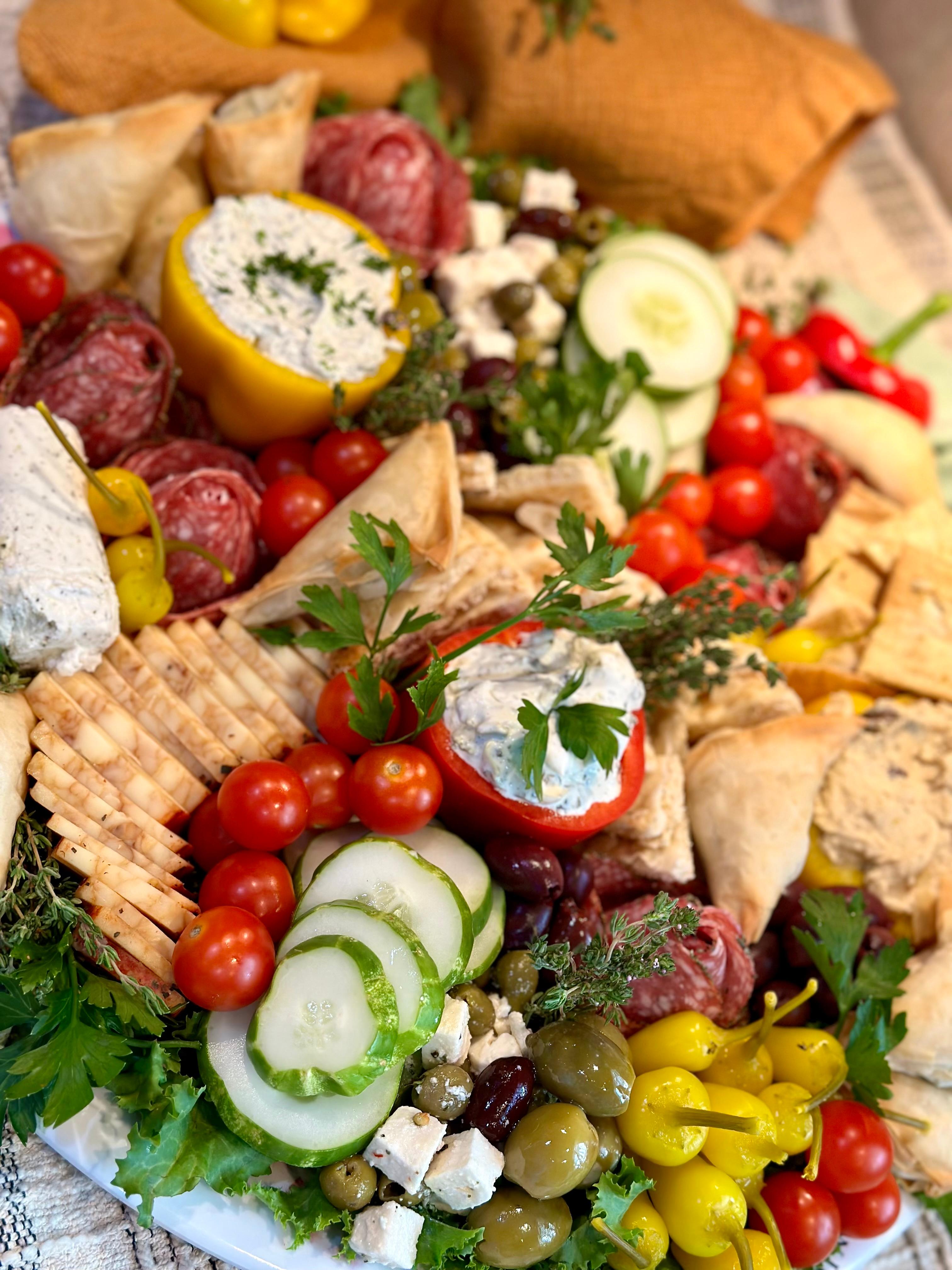 Vibrant Mediterranean charcuterie board with fresh ingredients