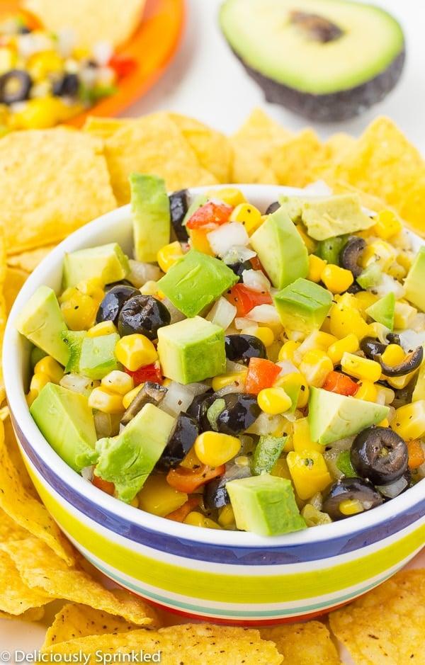 close-up shot of Anasazi bean and avocado salsa with tortilla chips