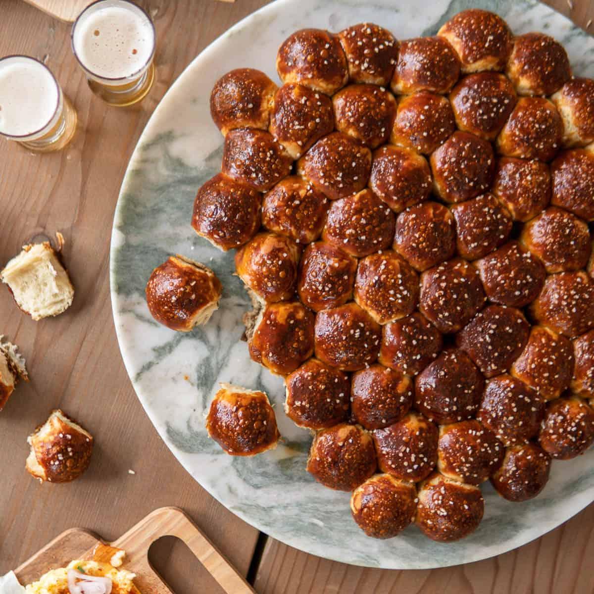 slices of beer-pretzel strata on a plate, warm and inviting