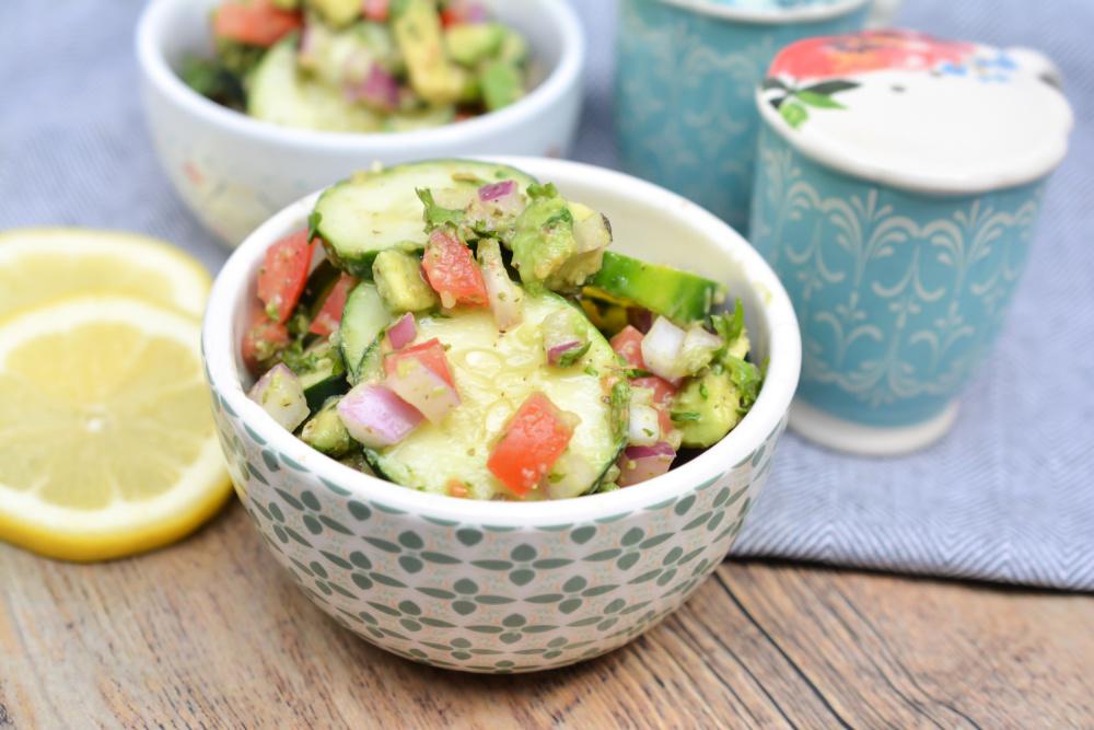 Overhead shot of the assembled Keto Avocado and Leek Salad in a glass bowl