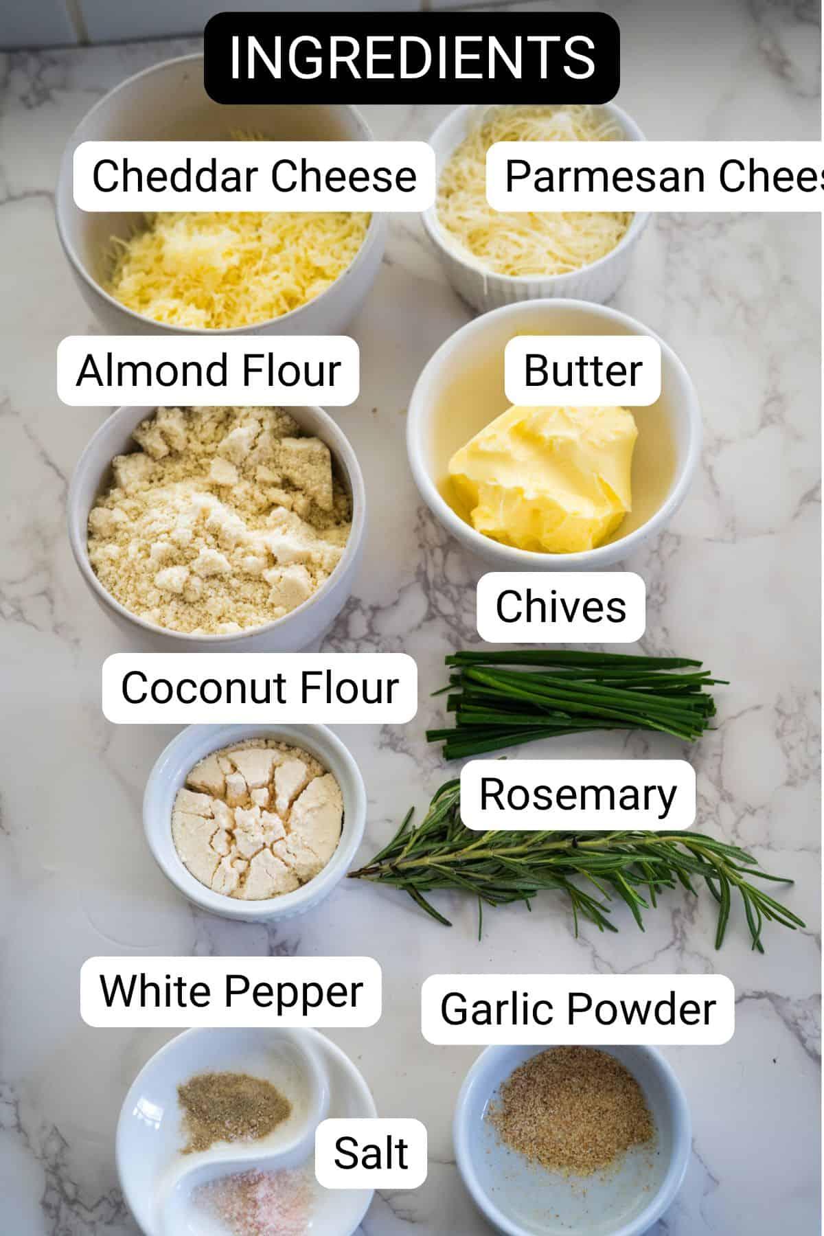 ingredients for garlic herb keto cheese wafers: shredded cheese, garlic powder, herbs, almond flour, butter