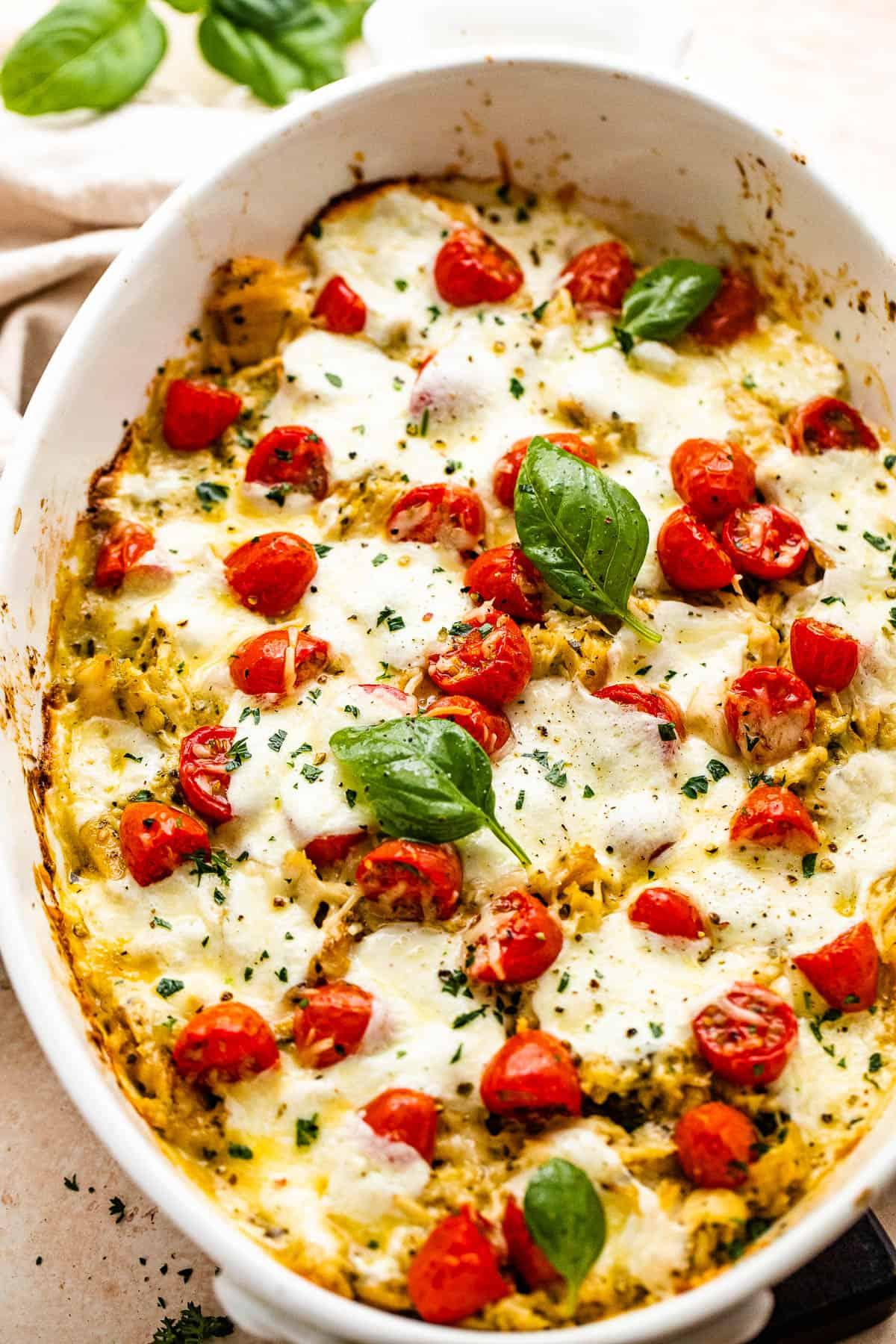 tomato basil chicken casserole golden brown and bubbly