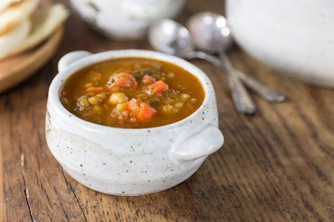 close up shot of moroccan lentil soup with a spoon