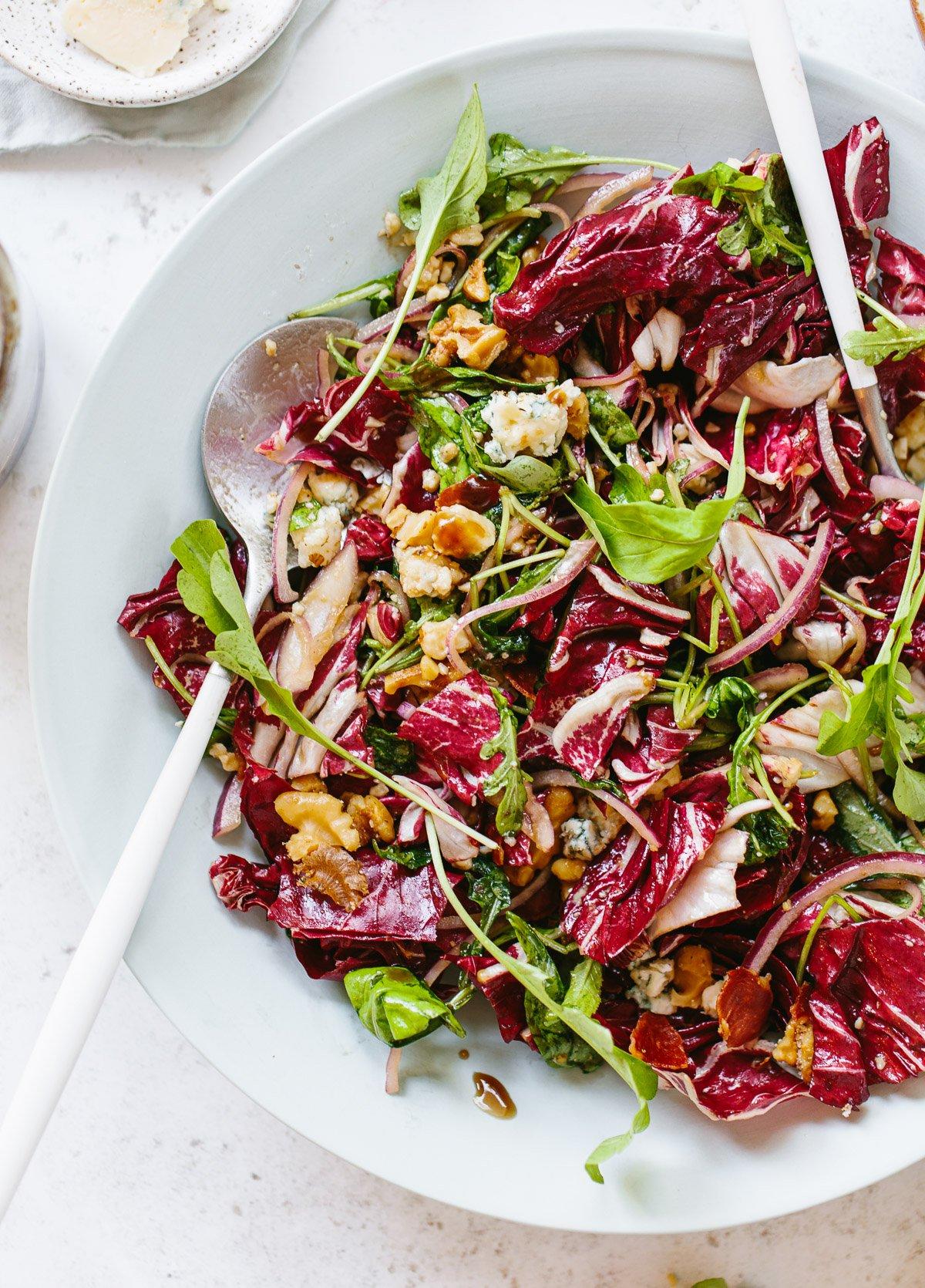 close-up of radicchio leaves with gorgonzola cheese and walnuts