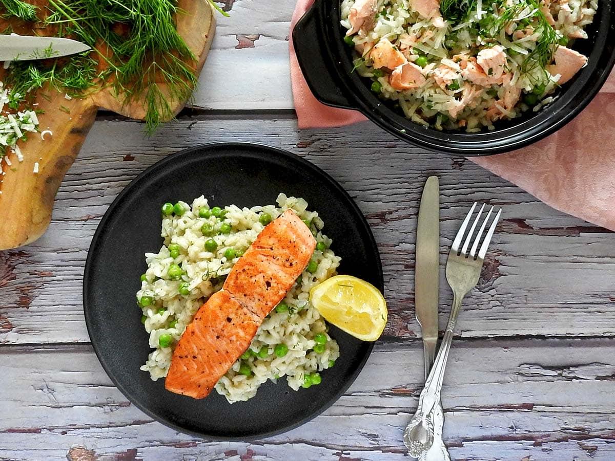 A serving of smoked salmon risotto with a fork, ready to eat