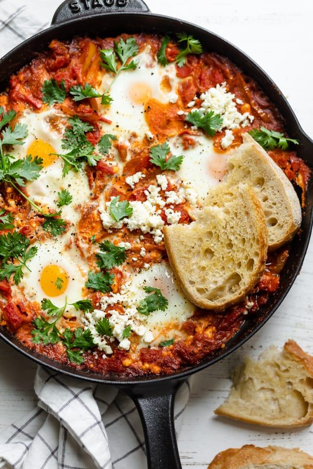 Mediterranean Shakshuka with feta cheese and crusty bread