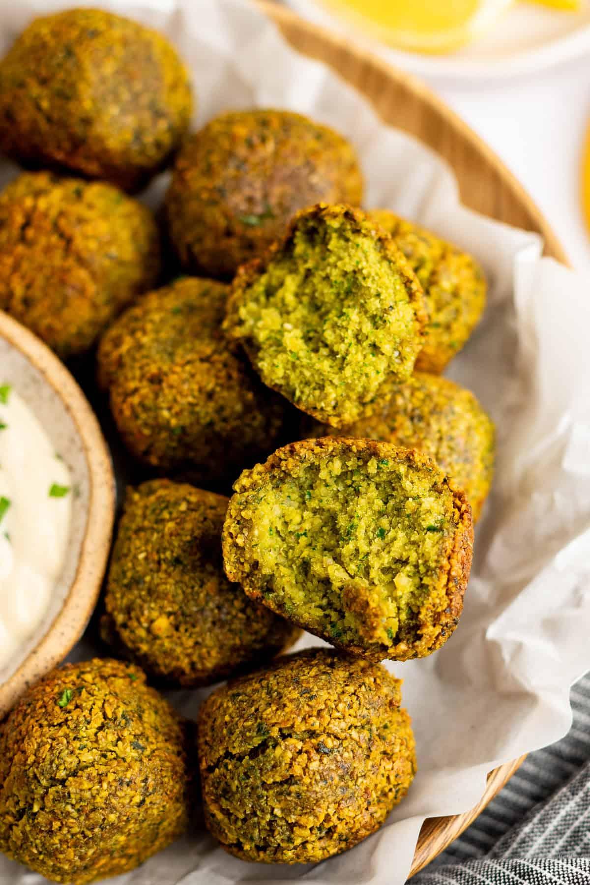 close-up shot of uncooked falafel mixture with visible jalapeño and cheese