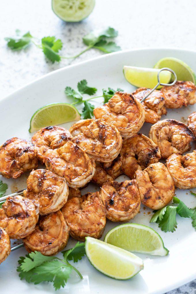 Close up of a delicious plate of Cumin-Lime Grilled Shrimp Skewers
