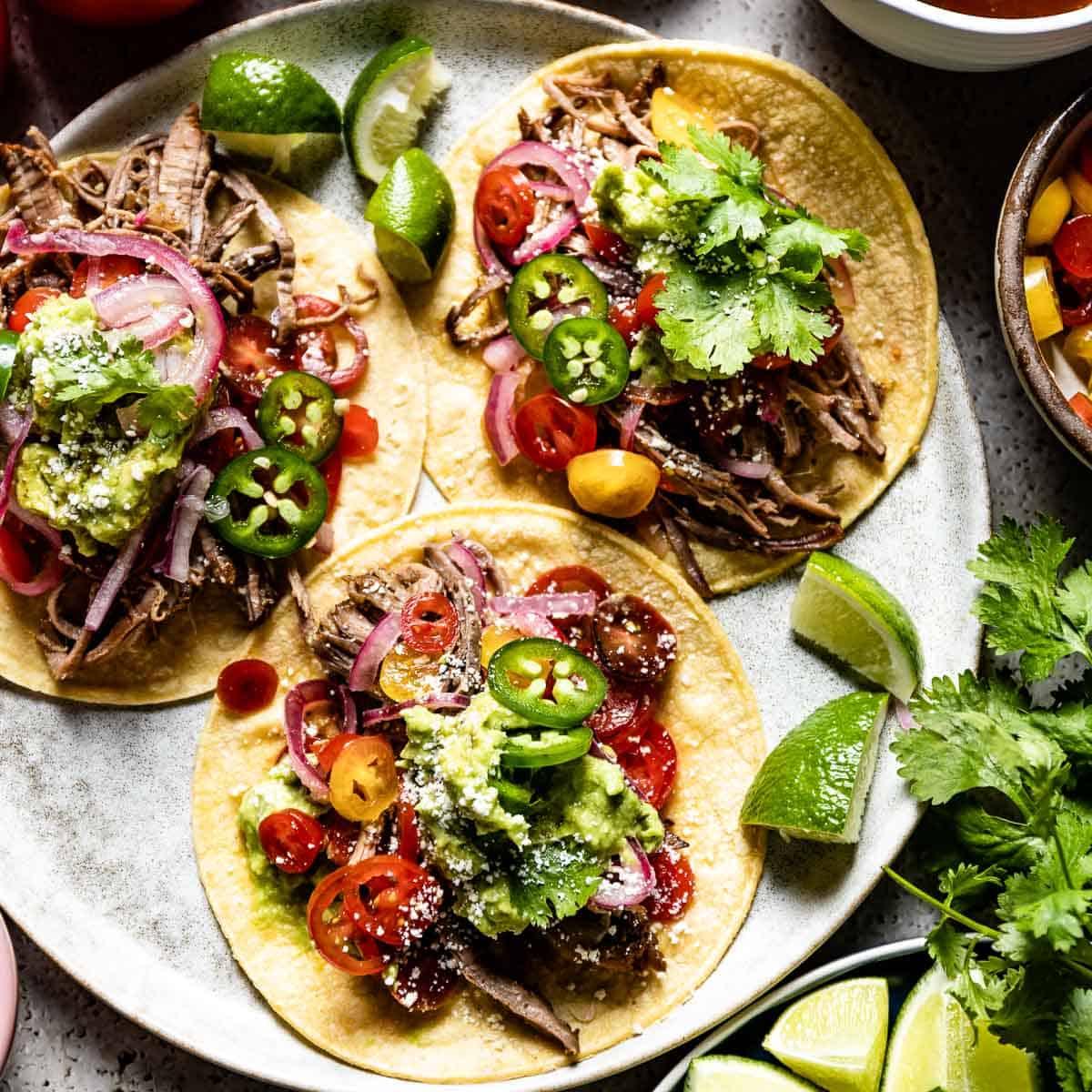 Texas smoked brisket tacos with various toppings