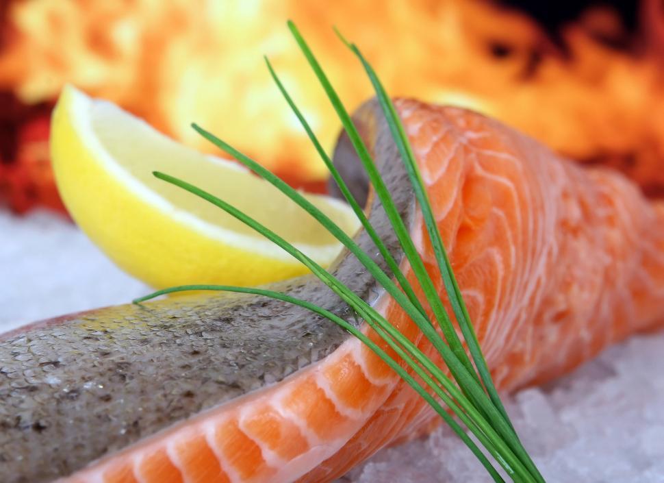 Close-up of fresh fish fillets on a bed of ice