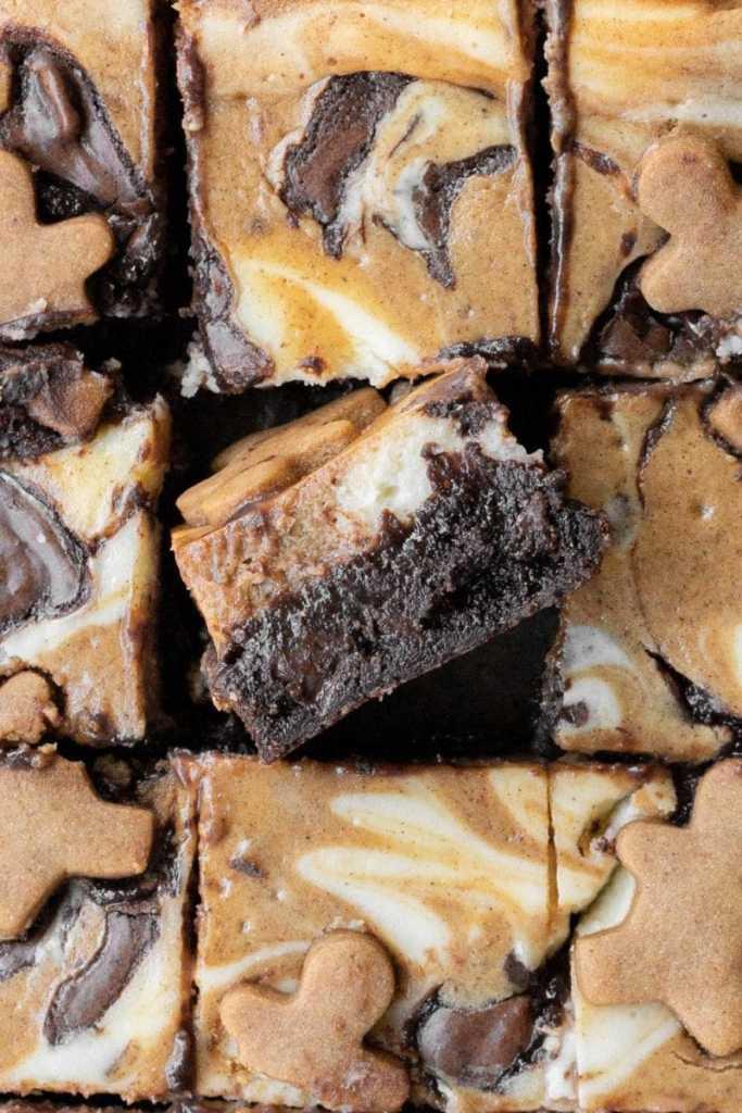 close up shot of a slice of gingerbread brownie with cream cheese swirl