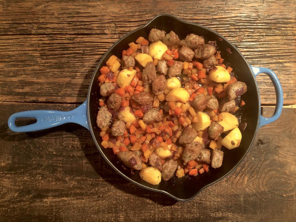 turnip and sausage hash in skillet