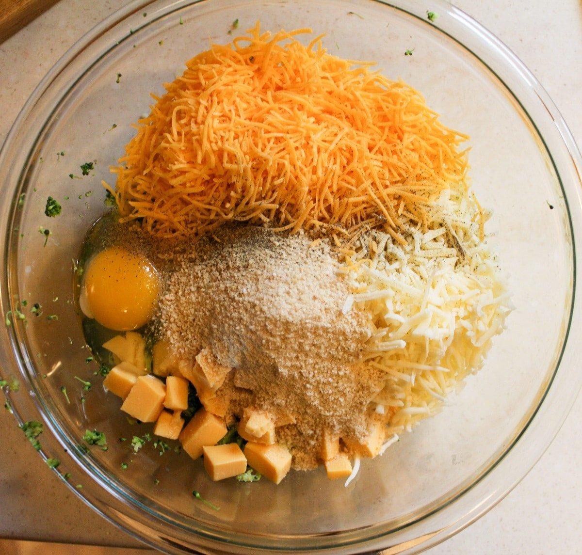 close-up of mixing bowl with ingredients for broccoli cheddar bites