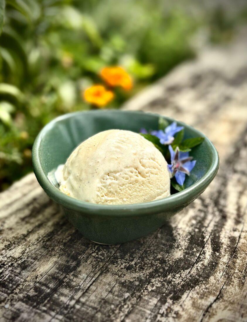 scoops of brown butter ice cream in a bowl