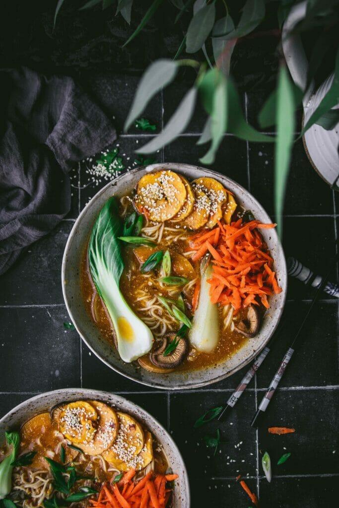 Close up shot of Miso Ramen, highlighting the sesame seeds and garlic
