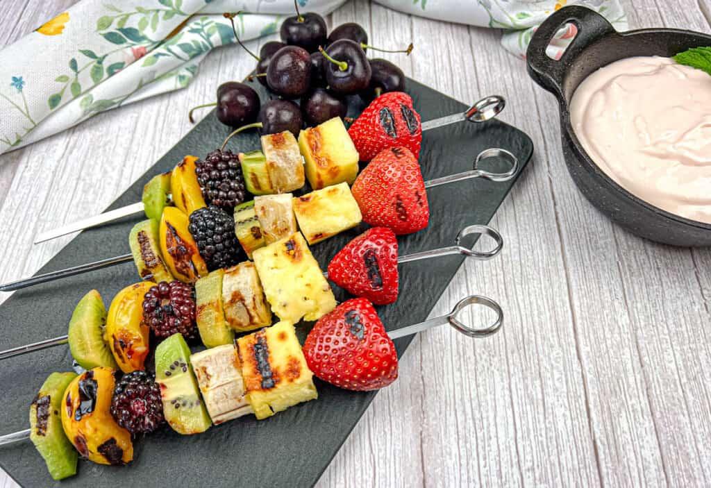 Close-up of colorful fruity cherry kabobs on a plate