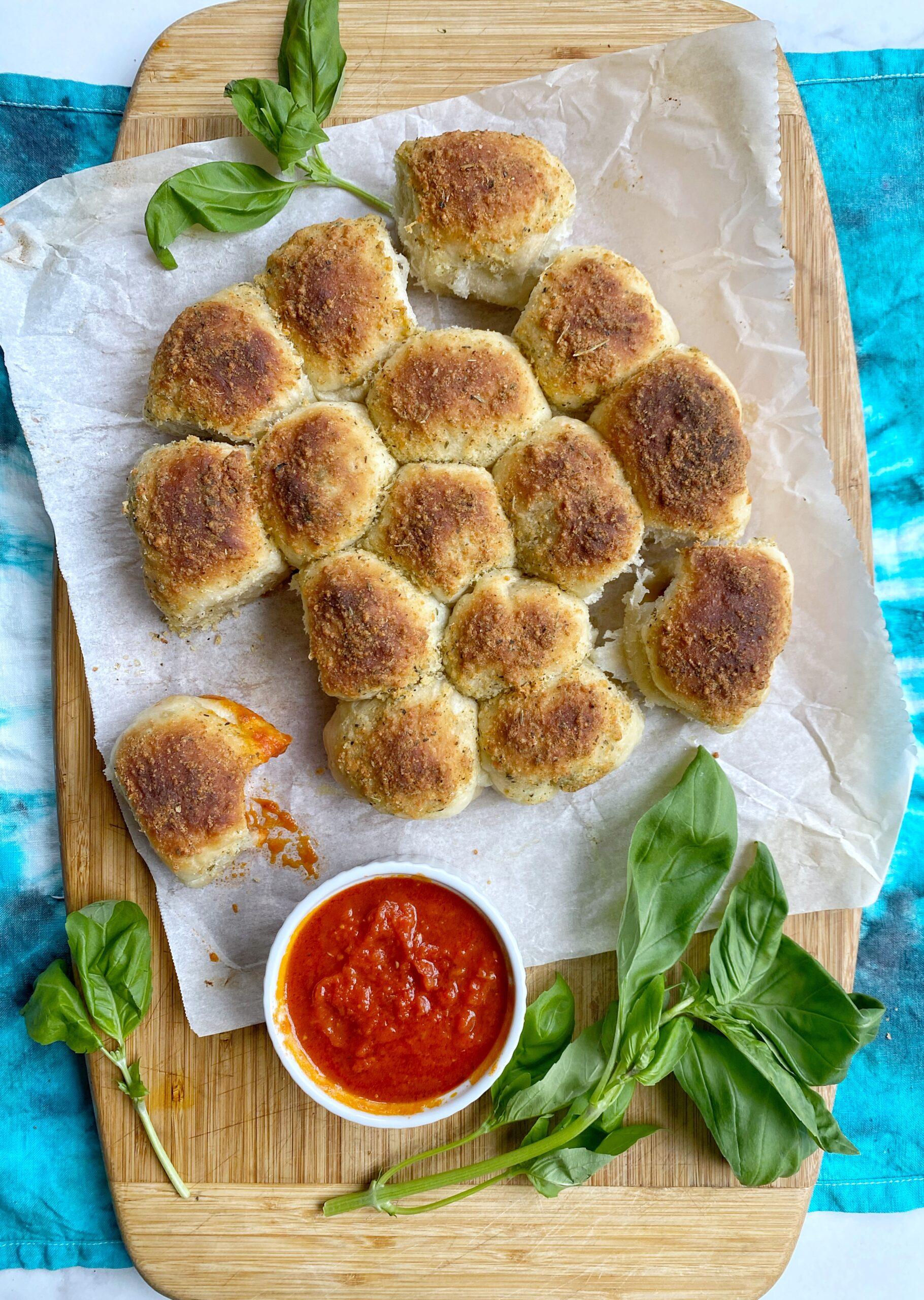 chicken nugget pizza bites on a baking sheet, kid-friendly food