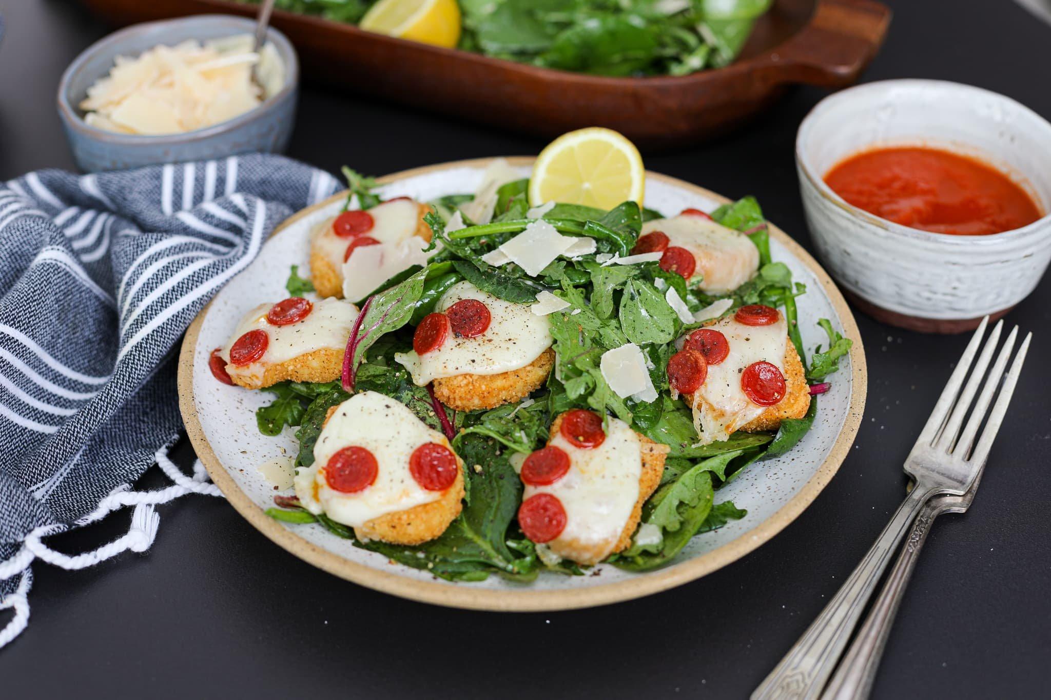finished chicken nugget pizza bites served on a plate