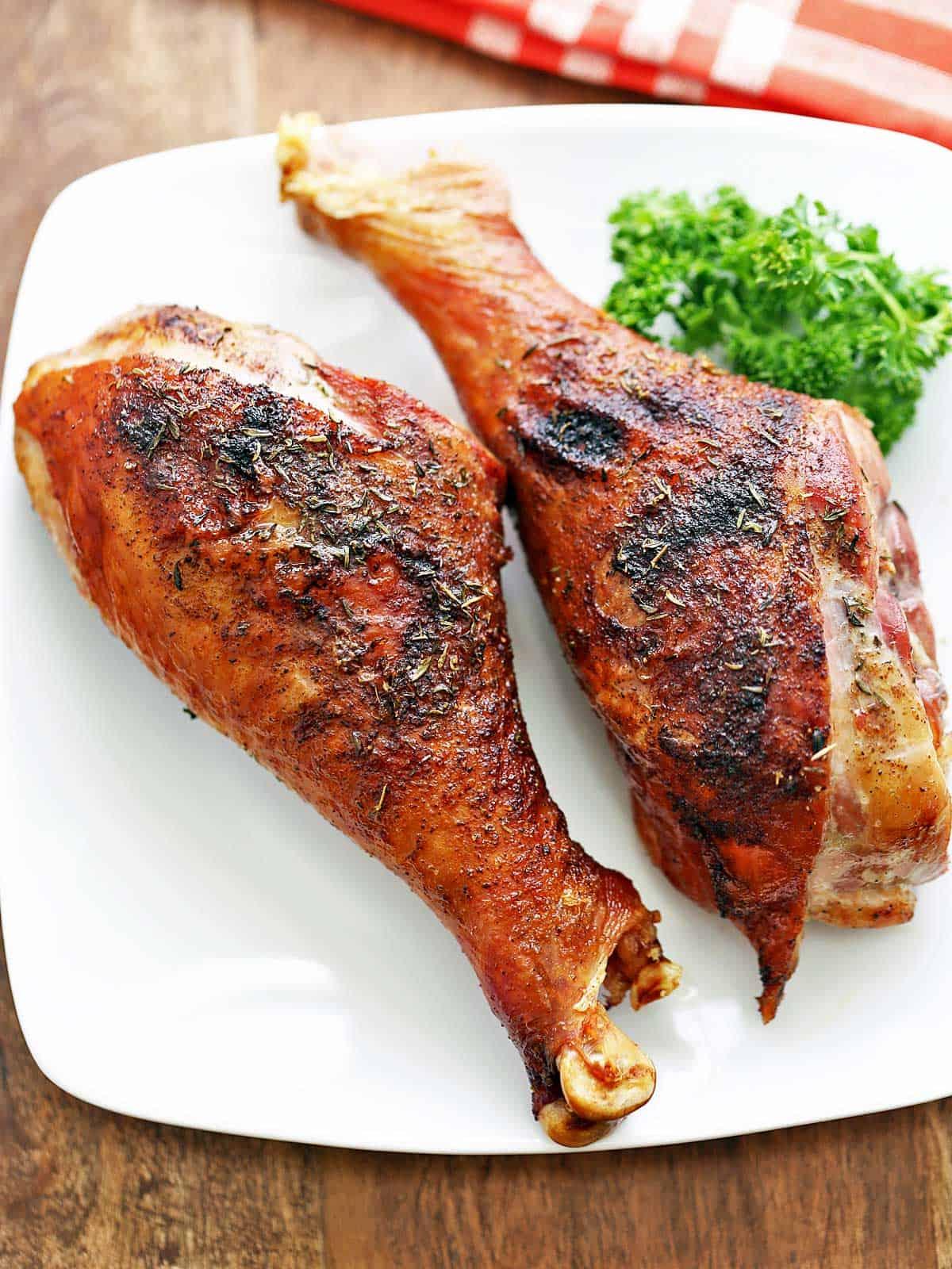 Close-up of a perfectly roasted turkey leg with crispy herb-crusted skin