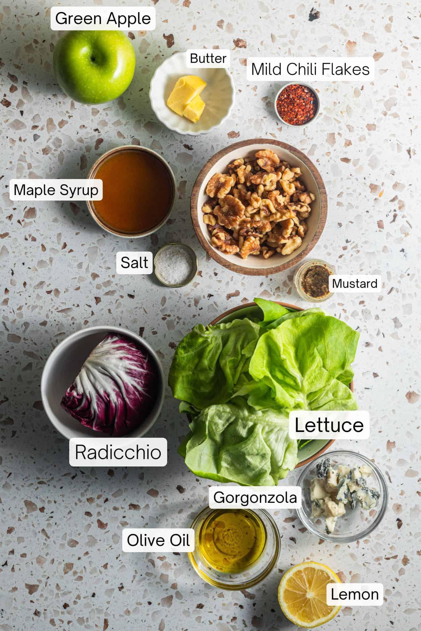 ingredients for radicchio and gorgonzola salad laid out on a wooden table