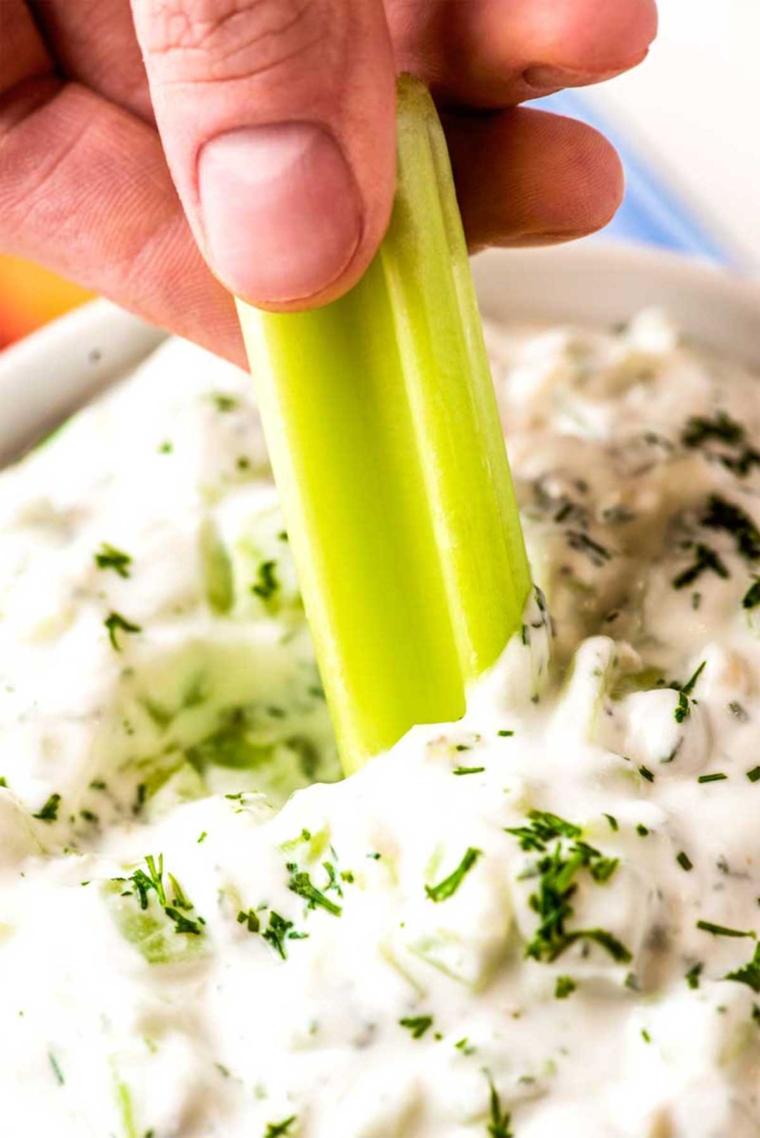 close up of tzatziki sauce being prepared
