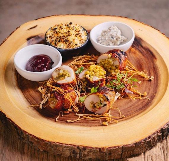 rustic bowls and wooden cutting board with food