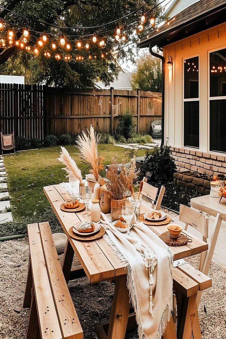 A beautifully decorated garden party setting with soft lighting and comfortable seating