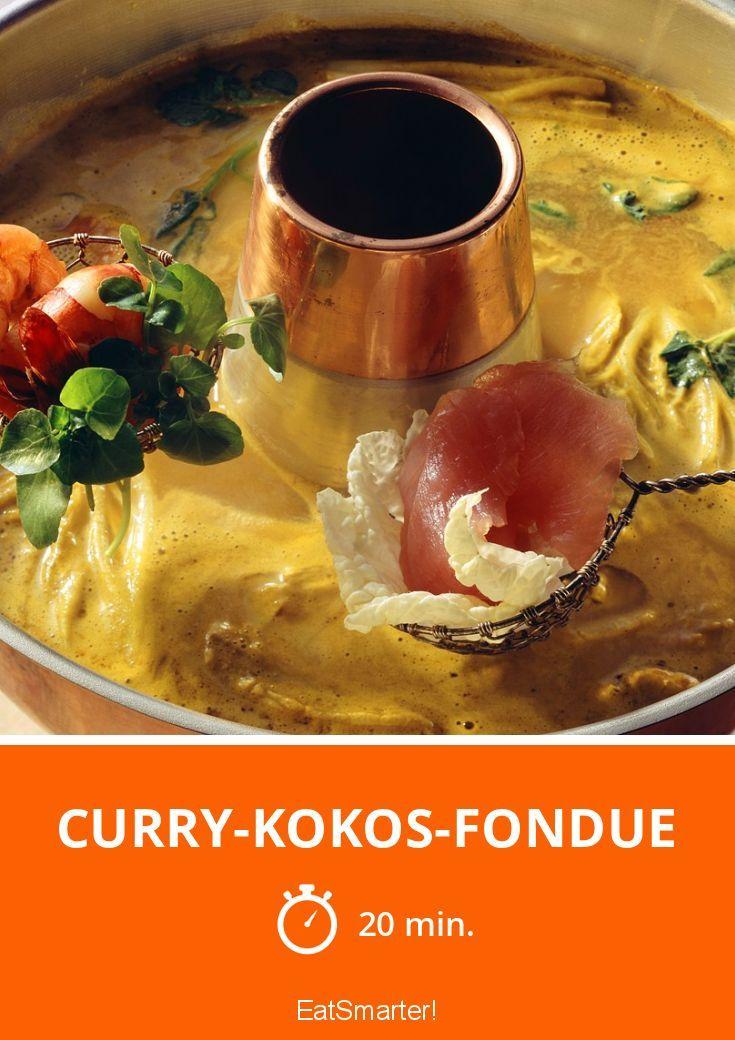 close-up of Thai Coconut Curry Chocolate Fondue bubbling in a fondue pot